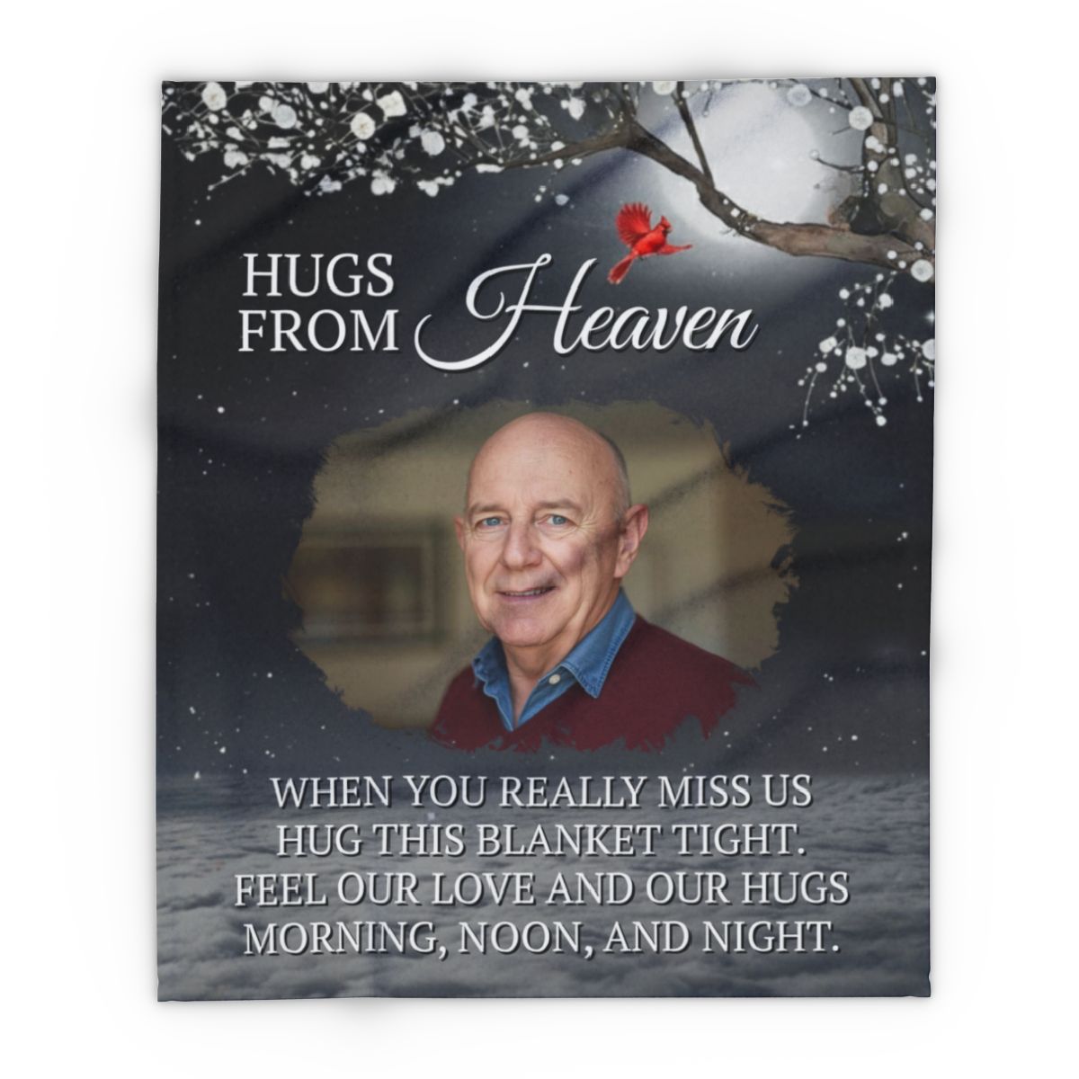 Memorial card with a photo of a man and text 'Hugs from Heaven' on a dark background with snowflakes.