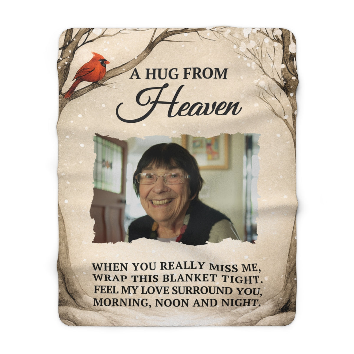 Blanket with a photo of a woman and text 'A Hug from Heaven' on a white background
