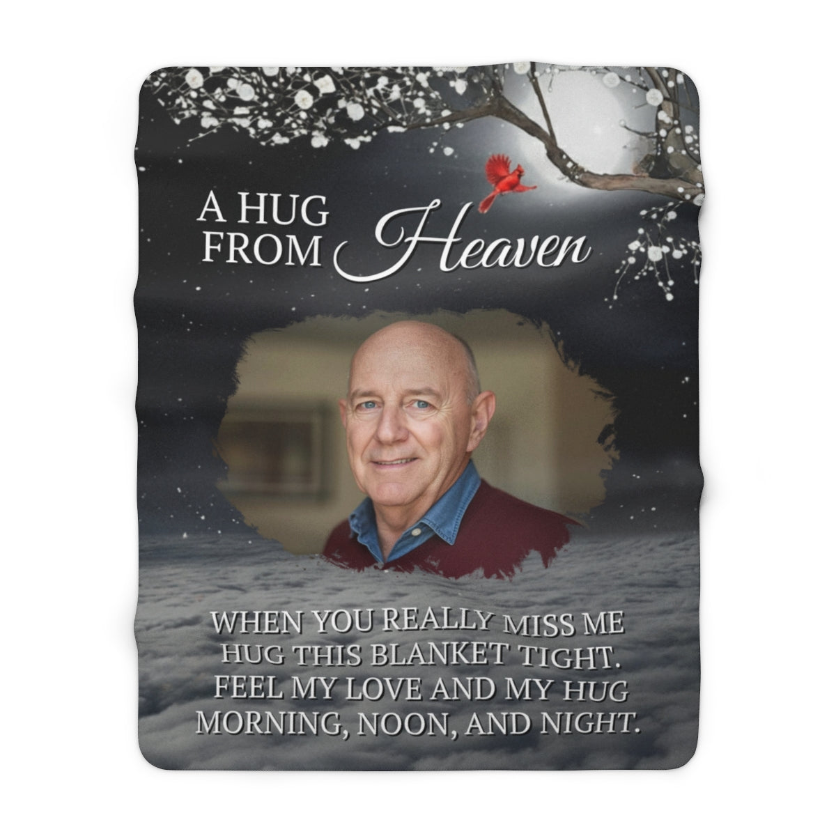Blanket with a photo of a man and text 'A Hug from Heaven' on a snowy background